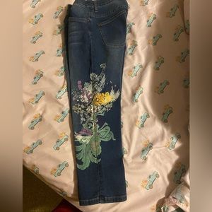 Venus size 6 stretch crop jean with multi color painted boho design.